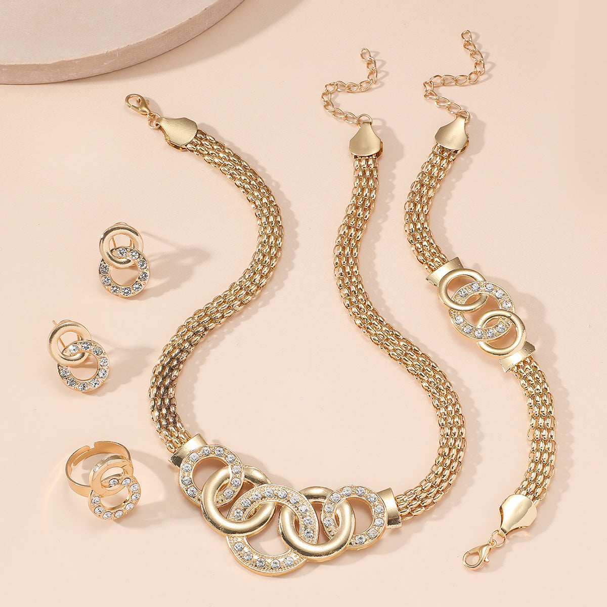 g necklace stud earrings bracelet ring suit