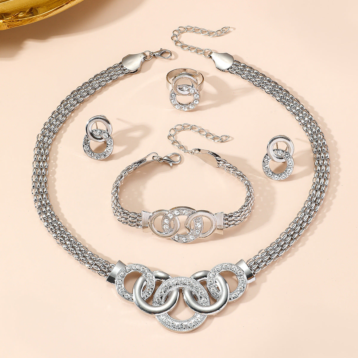 g necklace stud earrings bracelet ring suit