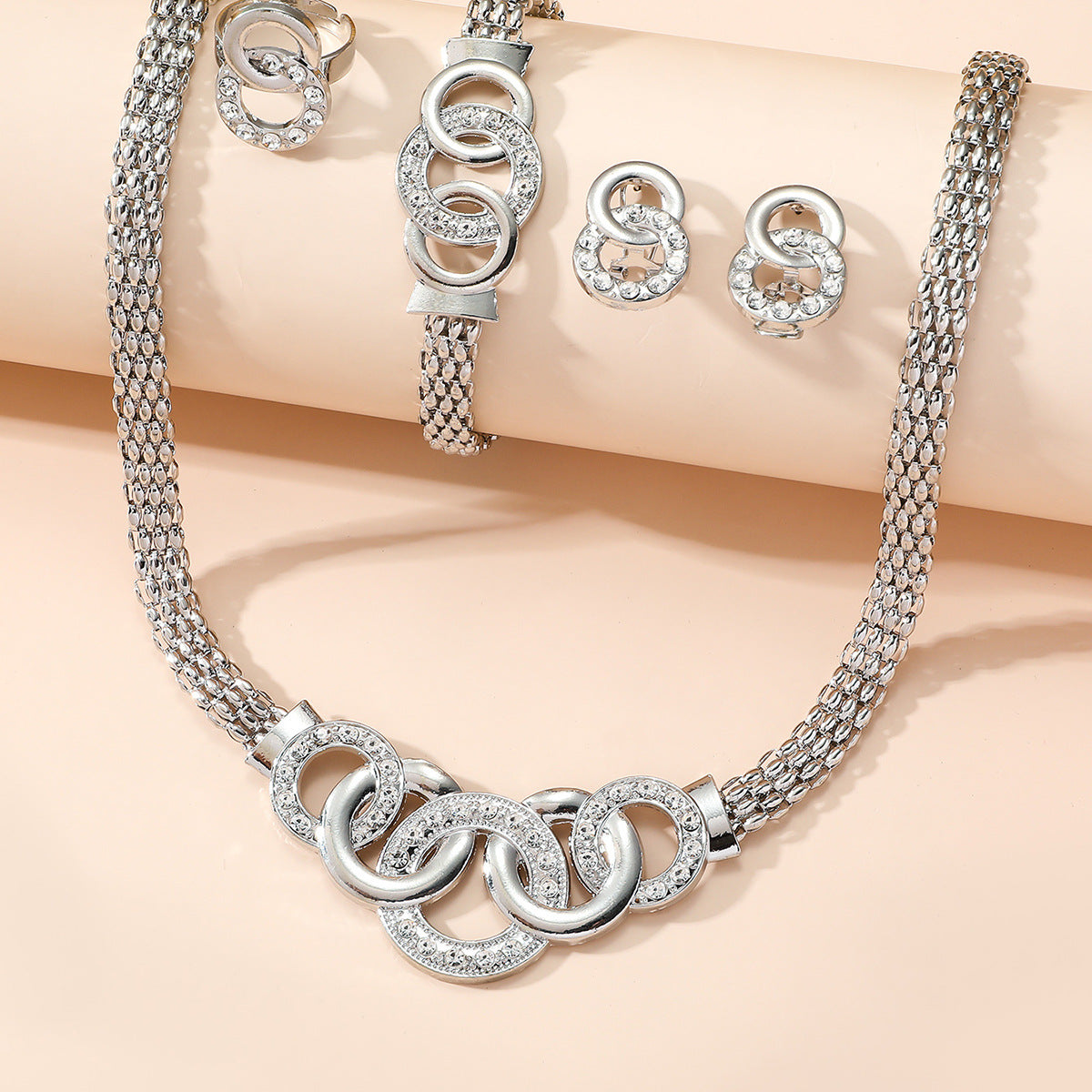 g necklace stud earrings bracelet ring suit